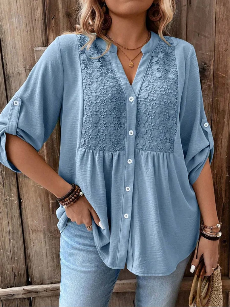 Noor – Blus med V-hals och knappar