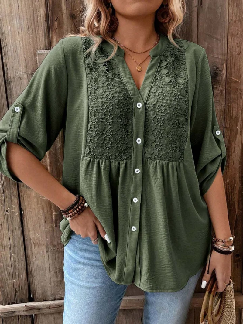 Noor – Blus med V-hals och knappar
