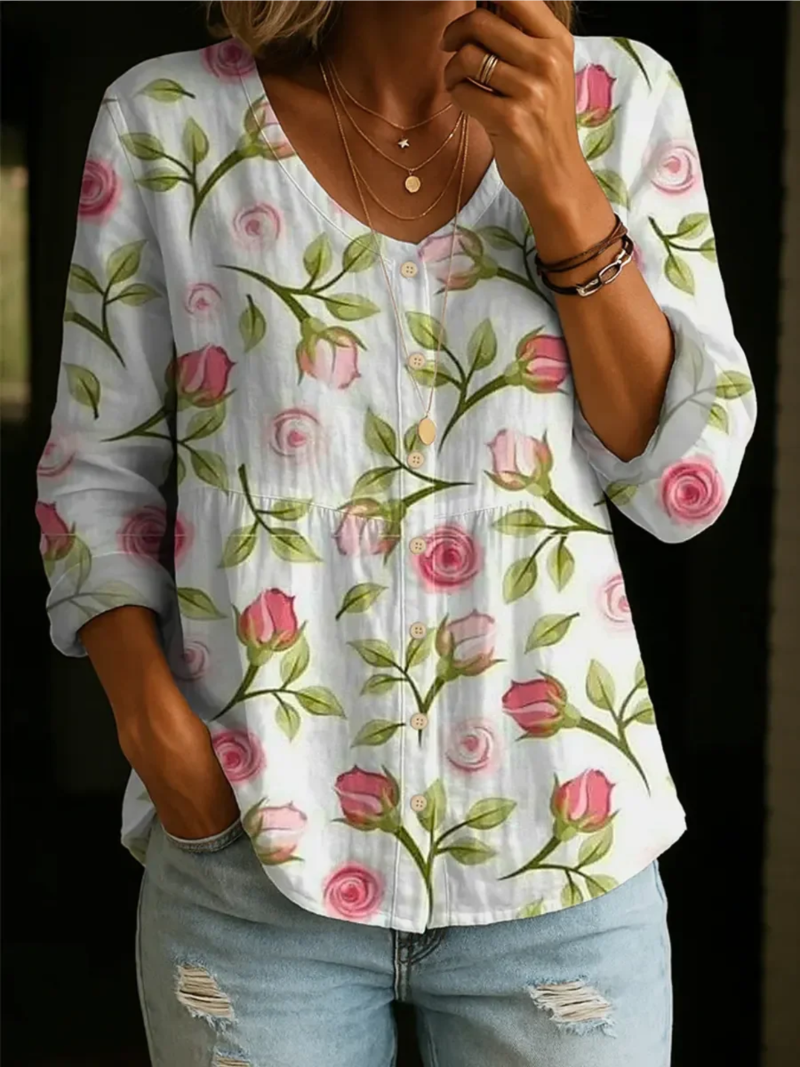 Lotta – Blus med blommönster