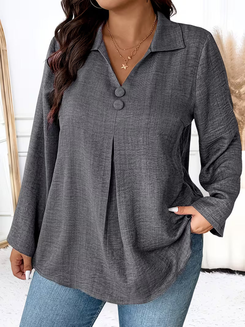 Lynn – Blus med knapppdetailj