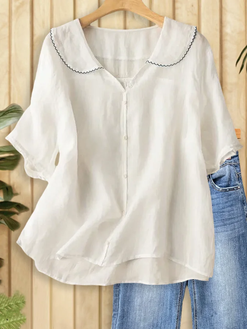 Eva – Blus med knapplåsning