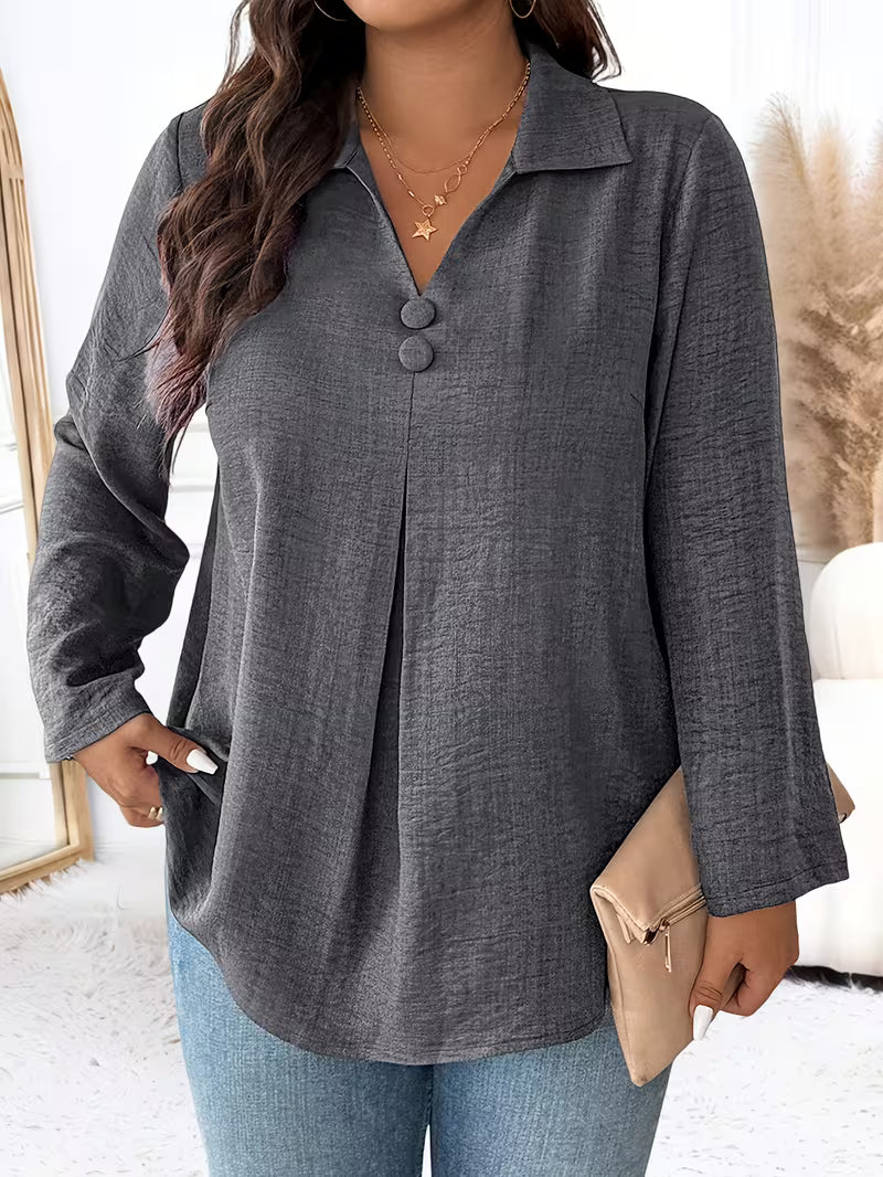 Lynn – Blus med knapppdetailj