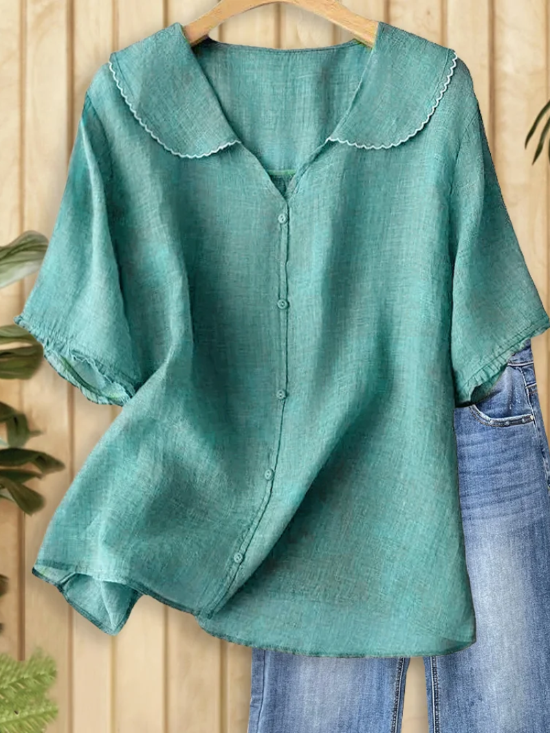 Eva – Blus med knapplåsning